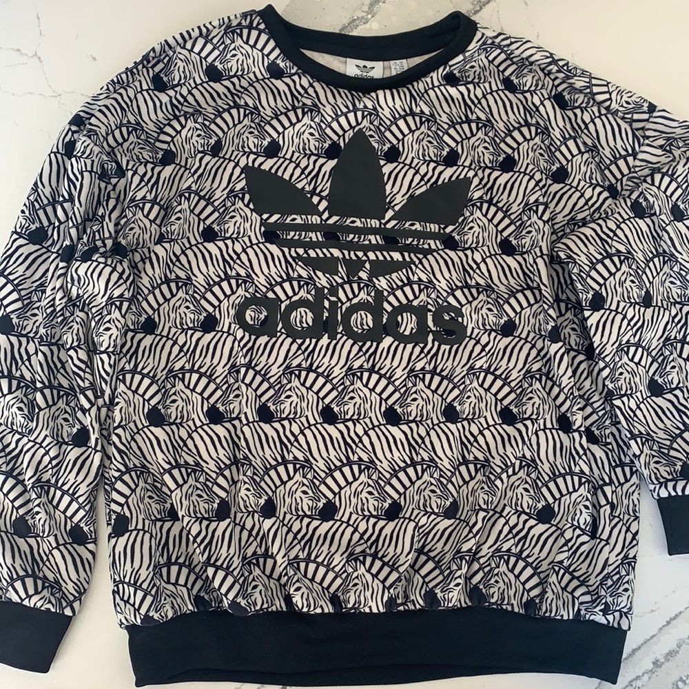 Adidas sweatshirt with zebra print size M